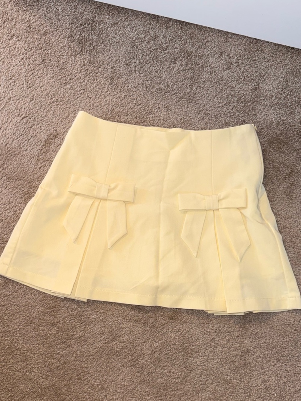 Yellow Mini Skirt with Front Bow Details
